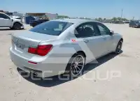 2013 BMW 740 фото