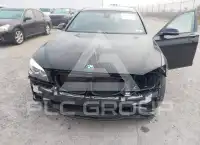 2014 BMW 740 фото