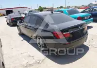 2014 BMW 740 фото