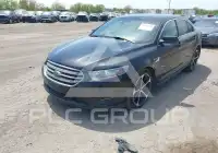 2014 Ford TAURUS фото