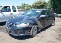 2014 Ford TAURUS фото