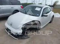2014 Volkswagen BEETLE фото