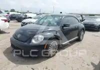 2014 Volkswagen BEETLE фото
