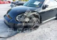2014 Volkswagen BEETLE фото
