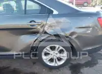 2015 Ford TAURUS фото