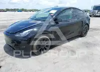 2023 Tesla Model Y фото