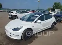 2023 Tesla Model 3 фото