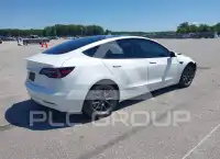 2023 Tesla Model 3 фото