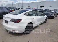 2023 Tesla Model 3 фото