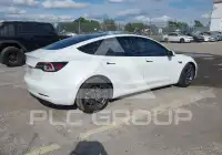 2023 Tesla Model 3 фото