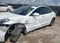 2023 Tesla Model 3 фото