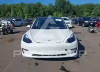2023 Tesla Model 3 фото