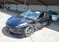 2023 Tesla Model 3 фото