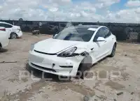 2023 Tesla Model 3 фото