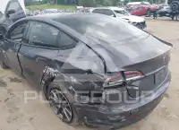 2023 Tesla Model 3 фото