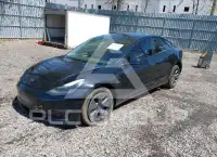 2023 Tesla Model 3 фото