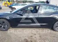2023 Tesla Model 3 фото
