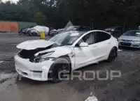 2023 Tesla Model 3 фото