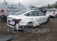2023 Tesla Model 3 фото