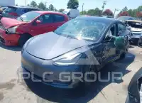 2023 Tesla Model 3 фото