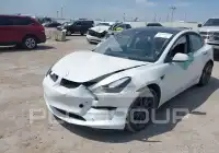 2023 Tesla Model 3 фото