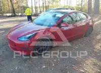 2023 Tesla Model 3 фото