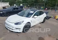 2023 Tesla Model 3 фото