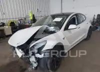 2023 Tesla Model 3 фото