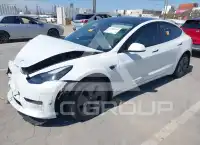 2023 Tesla Model 3 фото