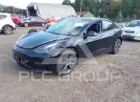 2023 Tesla Model 3 фото