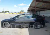2023 Tesla Model 3 фото