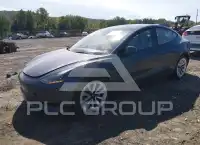 2023 Tesla Model 3 фото
