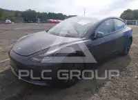 2023 Tesla Model 3 фото
