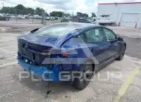 2023 Tesla Model 3 фото