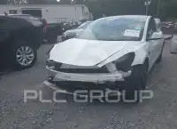 2023 Tesla Model 3 фото