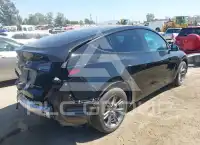 2024 Tesla Model Y фото