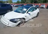 2024 Tesla Model 3 фото