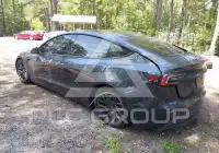 2025 Tesla Model 3 фото