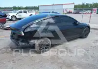 2025 Tesla Model 3 фото