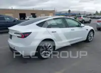 2025 Tesla Model 3 фото