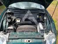 1997 MG 