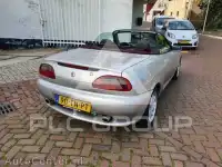 1998 MG 