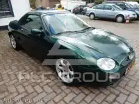 2001 MG 