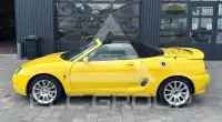 2002 MG 