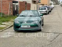 2002 MG 