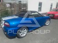 2002 MG 