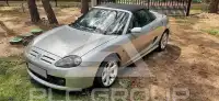 2002 MG 