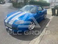 2002 MG 