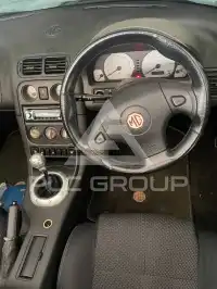 2002 MG 